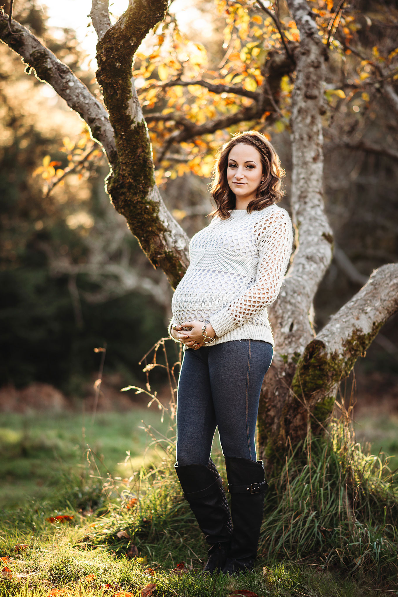 Fall maternity photography in a cozy sweater at sunset in East Sooke Park near Victoria.