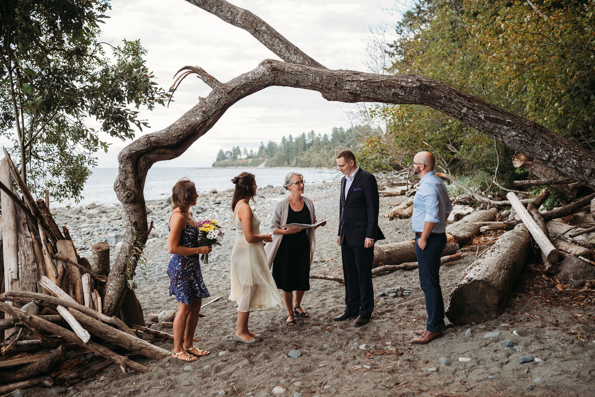 Beach elopement ceremony at Seal Bay Nature Park in the Comox Valley.