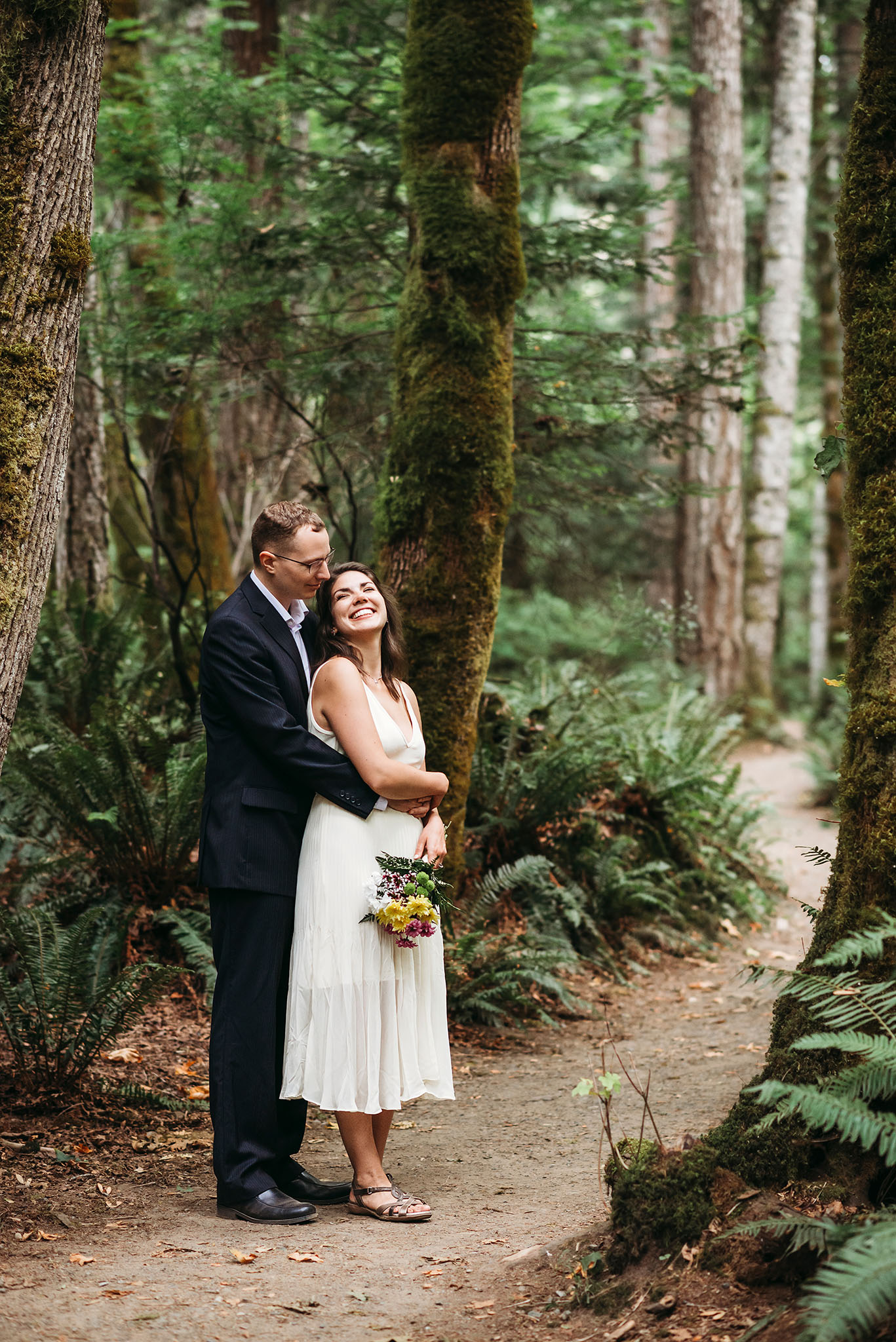 Wedding elopement couple embracing at Seal Bay Park in the Comox Valley.
